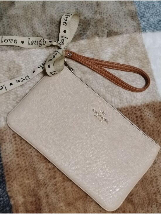 Coach Handbags - Coach Light Blush Pebbled Leather Corner Zip Wristlet Tan Strap Silver Hardware